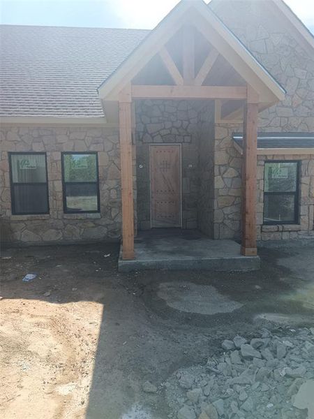 In-progress construction of a new home in , Graford, TX (Image 12).