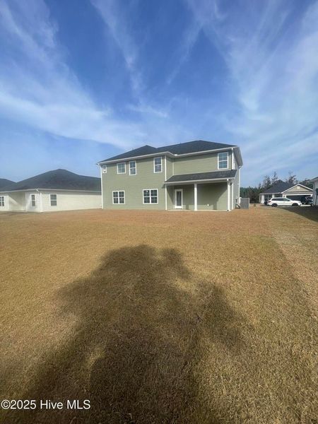 Exterior details and patio area of a home in Athens Acres, New Bern (Image 3).