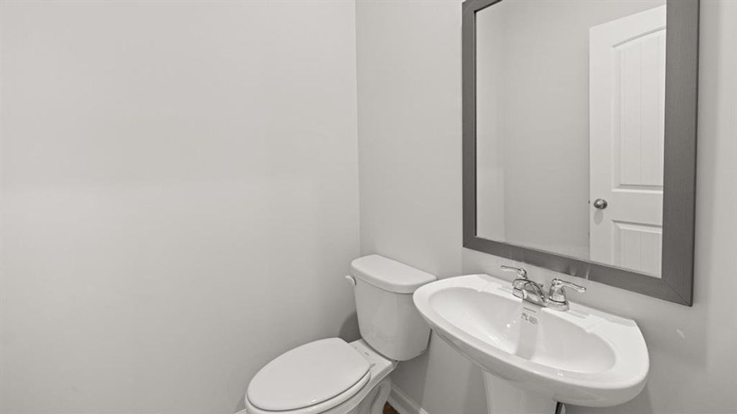 Furnished interior view inside a new home in Waypoint, Flowery Branch (Image 10).