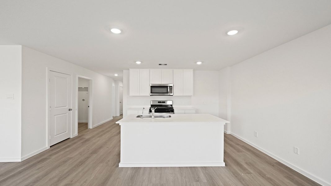 Furnished interior view inside a new home in Westward Pointe, Sealy (Image 6).