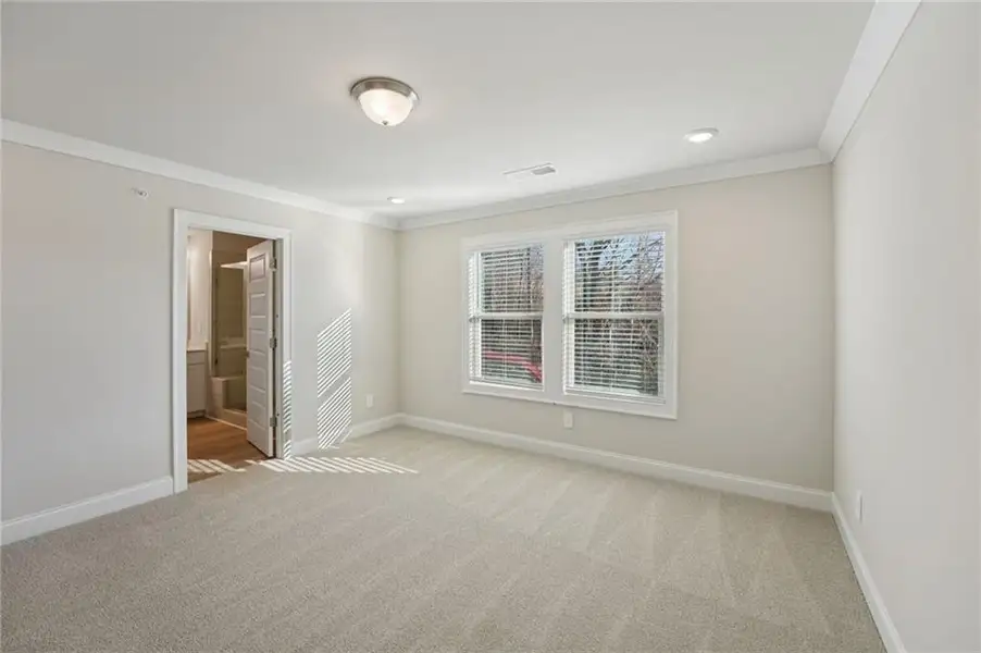 Spacious, unfurnished interior of a new home in Hemingway - Highland Series, Cumming (Image 48).