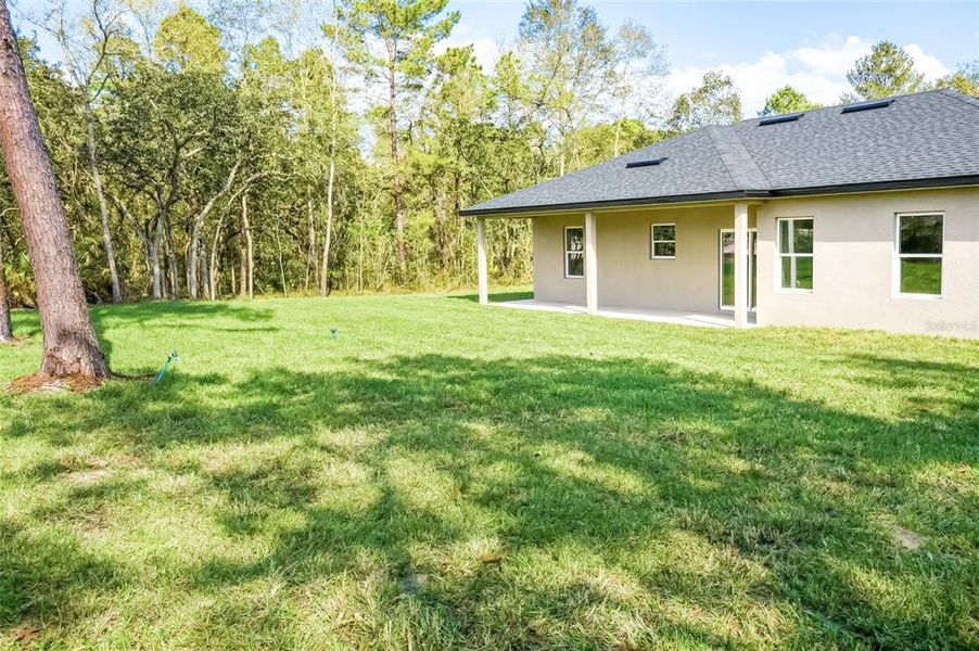 Exterior details and patio area of a home in , Citrus Springs (Image 4).