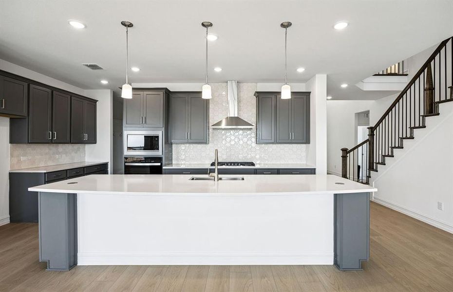 Island kitchen with pendant lights Island kitchen with pendant lights