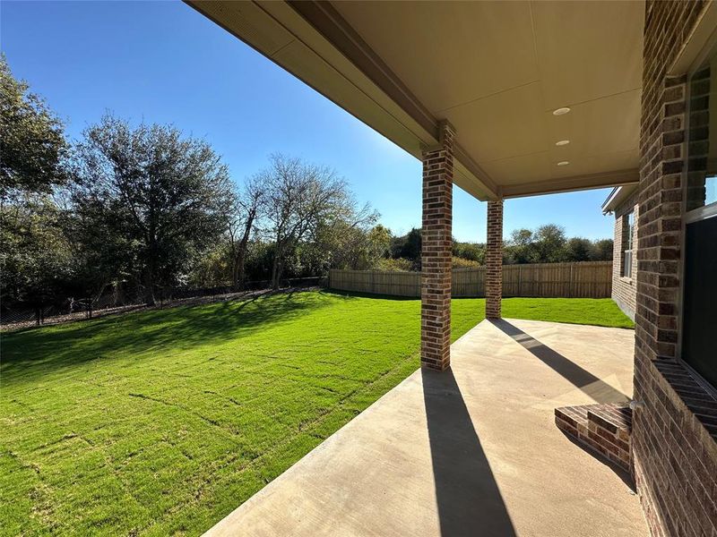 Fenced backyard featuring a patio Fenced backyard featuring a patio