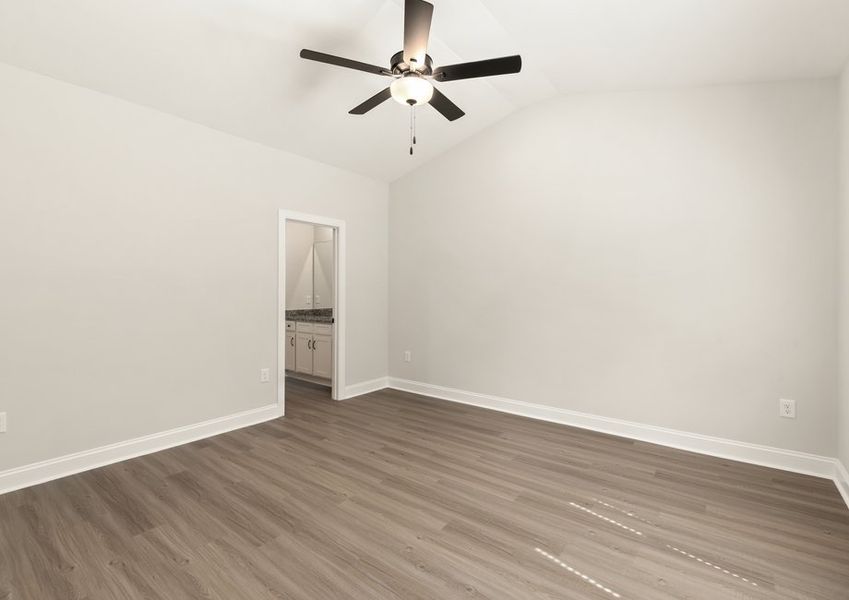 The master suite has an attached bathroom