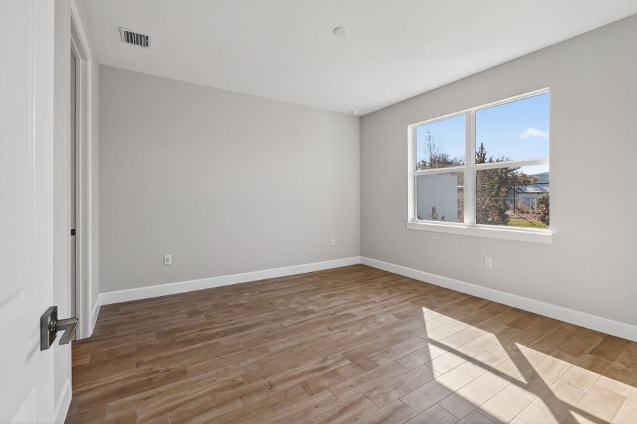 Spacious, unfurnished interior of a new home in Costa Pointe, Vero Beach (Image 54).