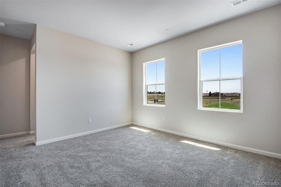 Spacious, unfurnished interior of a new home in Reunion Ridge, Commerce City (Image 21).