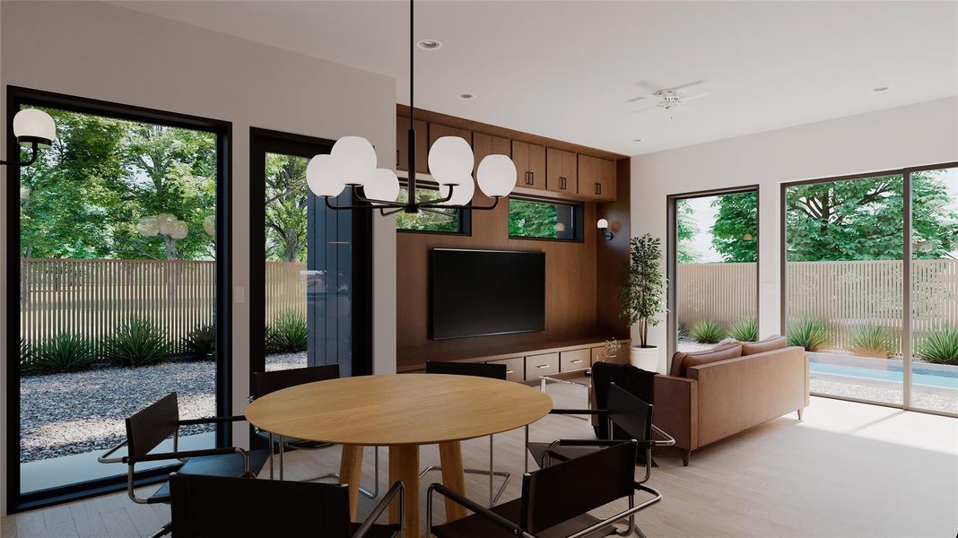 Dining space featuring light wood-style flooring, a chandelier, and recessed lighting Dining space featuring light wood-style flooring, a chandelier, and recessed lighting