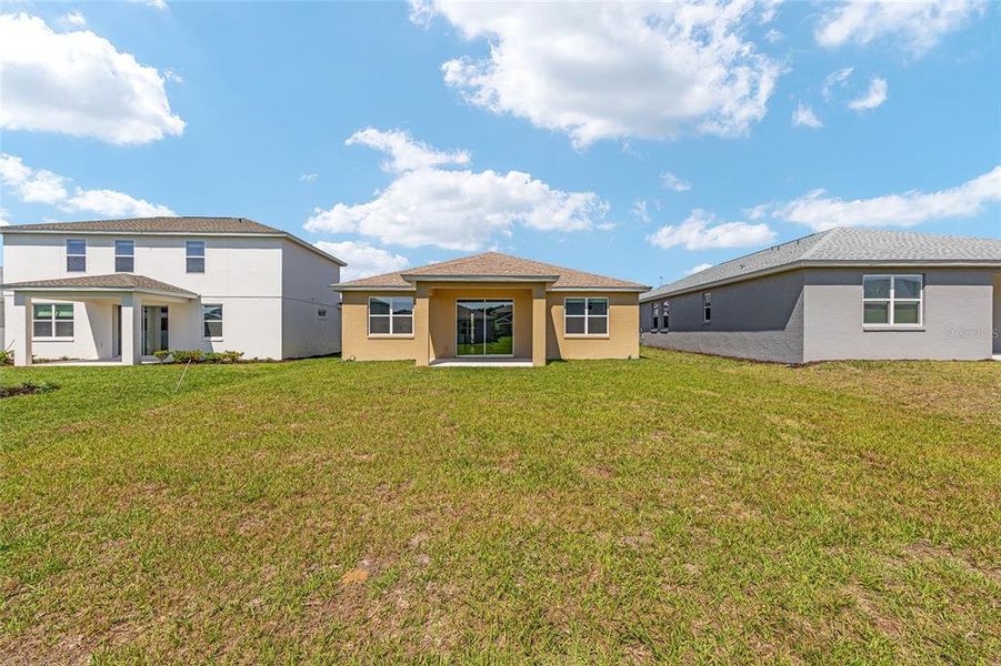 Exterior details and patio area of a home in Calesa Township, Ocala (Image 24).