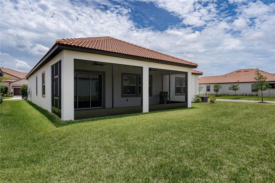 Exterior details and patio area of a home in Southshore Bay Active Adult, Wimauma (Image 4).
