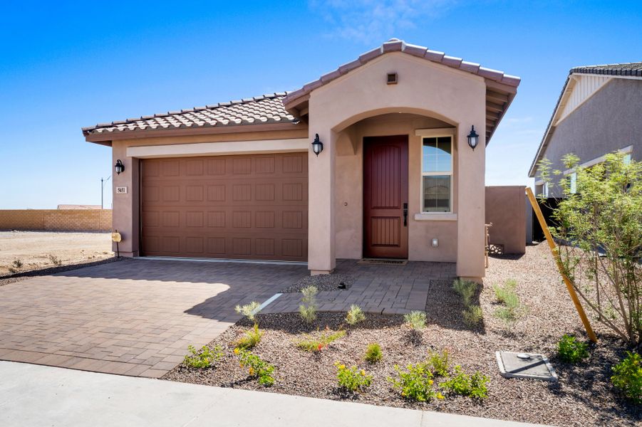 Representative exterior photo of a completed home built from the Terraza by Risewell Homes in Mira Vista at Victory, Buckeye, AZ (Image 1). Representative exterior photo of a completed home built from the Terraza by Risewell Homes in Mira Vista at Victory, Buckeye, AZ (Image 1).