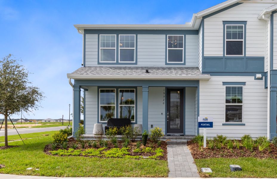 Representative exterior photo of a completed home built from the Foxtail - Exterior Unit by Pulte Homes in Lakehaven Estates, Clermont, FL (Image 22). Representative exterior photo of a completed home built from the Foxtail - Exterior Unit by Pulte Homes in Lakehaven Estates, Clermont, FL (Image 22).