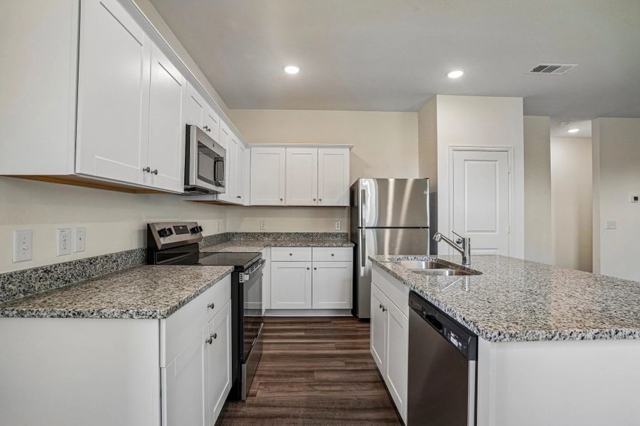 Representative furnished interior of a home built from the The Enterprise by Starlight Homes in Windmill Farms, Forney (Image 11).