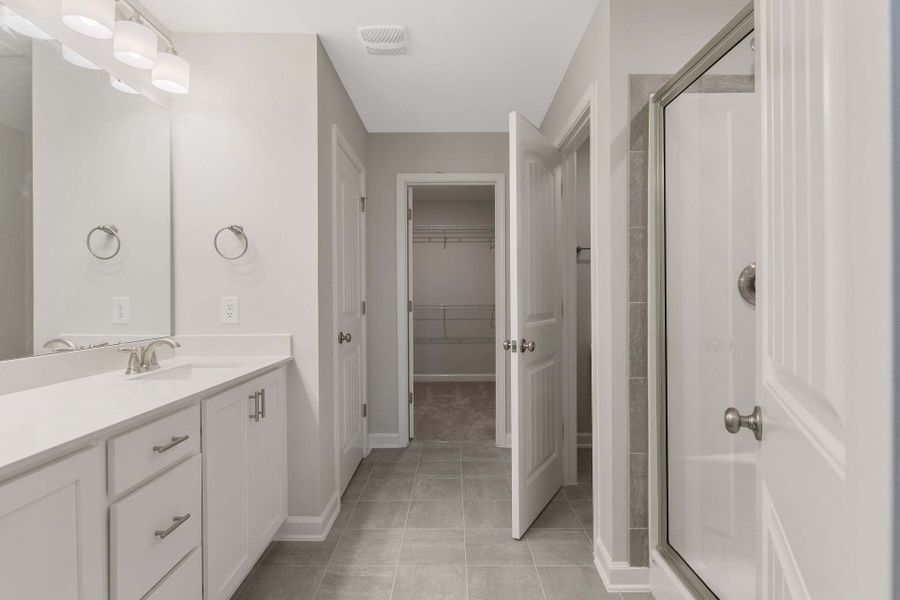 Representative furnished interior of a home built from the Magnolia by Caviness & Cates Communities in Bartlett Manor, Youngsville (Image 215).