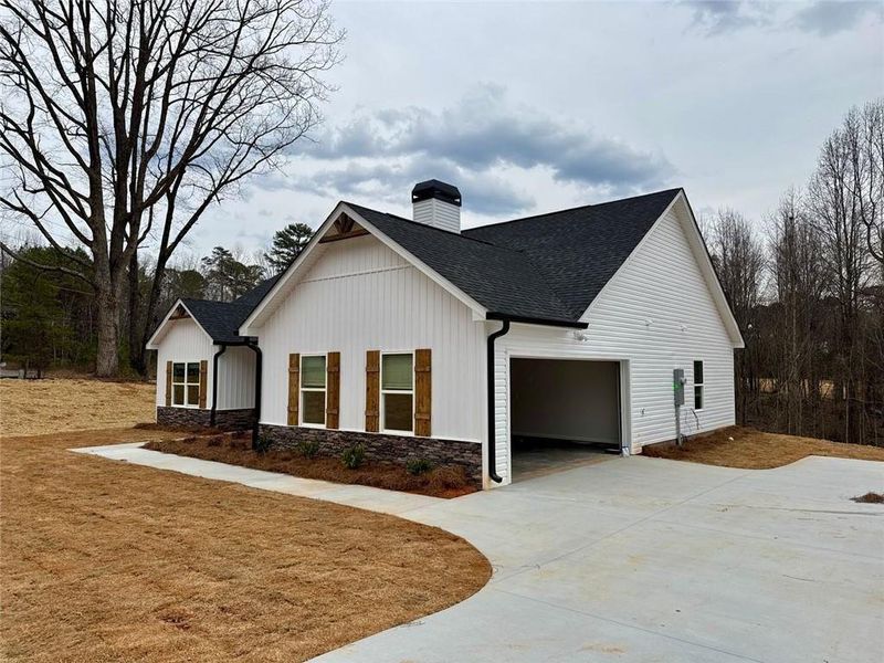 Front exterior of a new home in , Clarkesville, GA, highlighting curb appeal (Image 2).