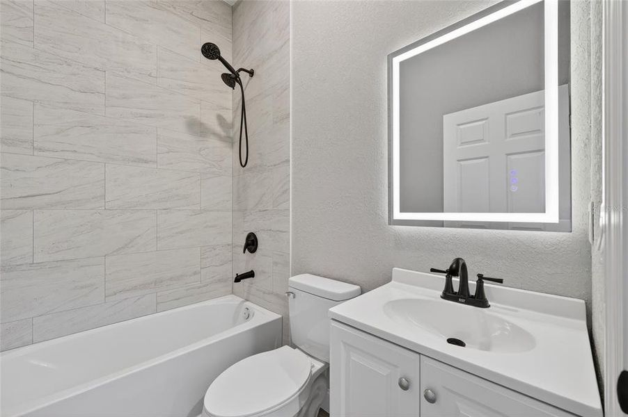 Furnished interior view inside a new home in , Port Charlotte (Image 9). Furnished interior view inside a new home in , Port Charlotte (Image 9).