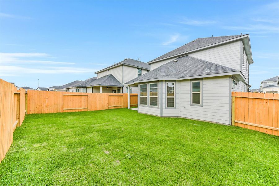Exterior details and patio area of a home in , Houston (Image 4).