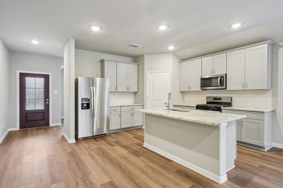 Furnished interior view inside a new home in Lakehaven - Signature Series, Farmersville (Image 11).