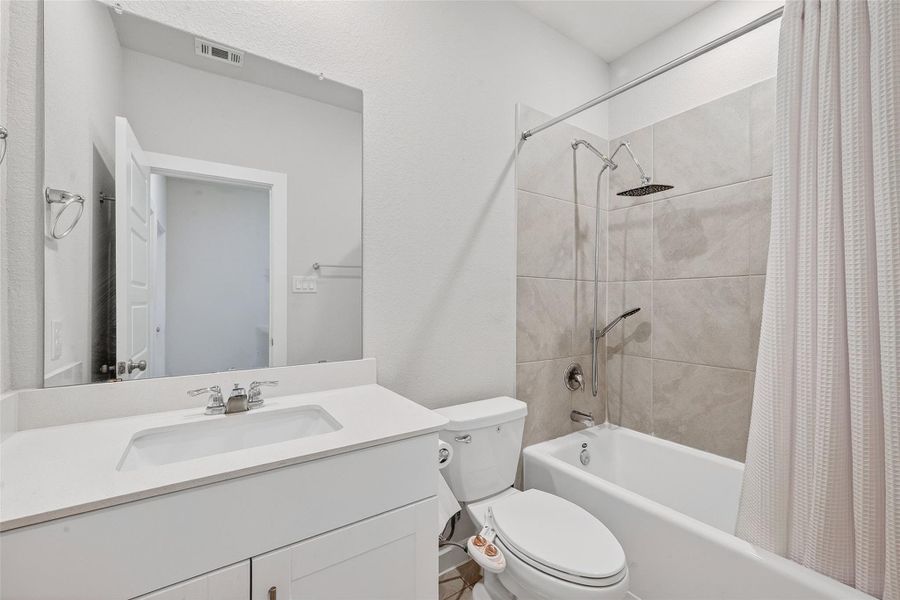 Furnished interior view inside a new home in McClendon Park Village, Houston (Image 11).