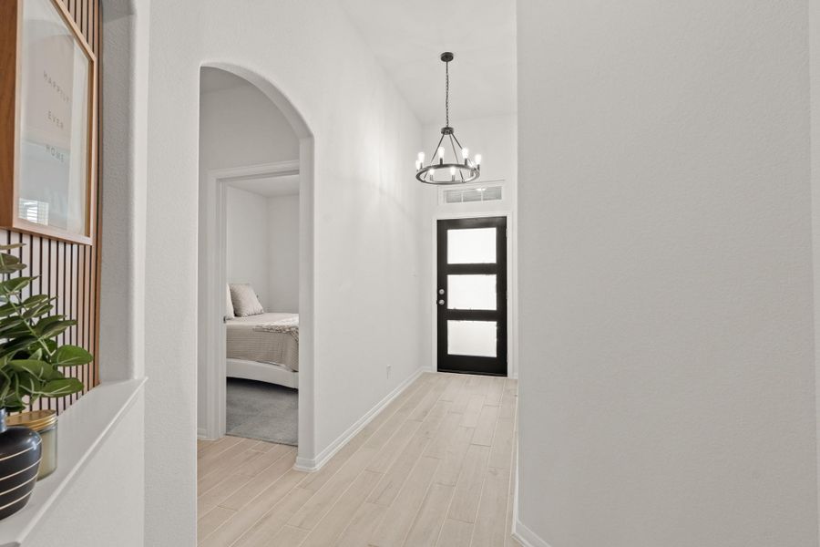 Heading back to the front of the home, we find the secondary bedrooms and office space!