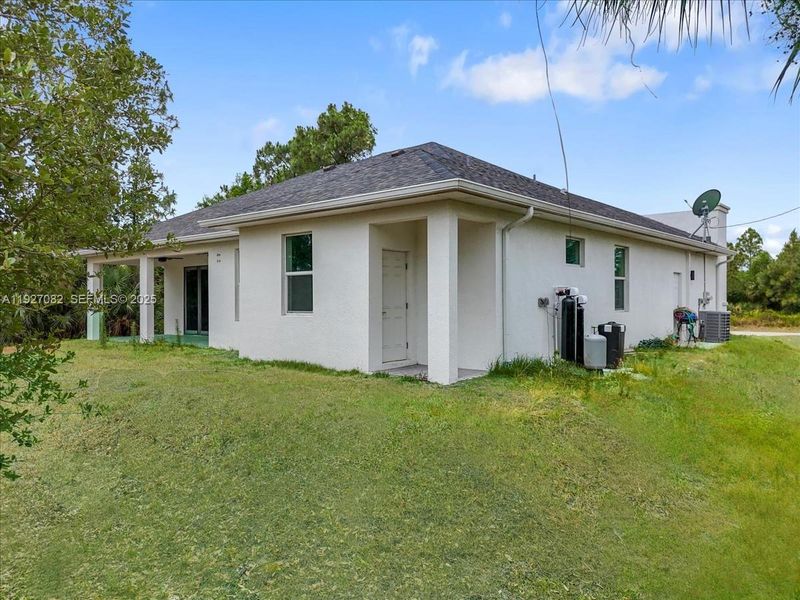 Exterior details and patio area of a home in , Lehigh Acres (Image 29).