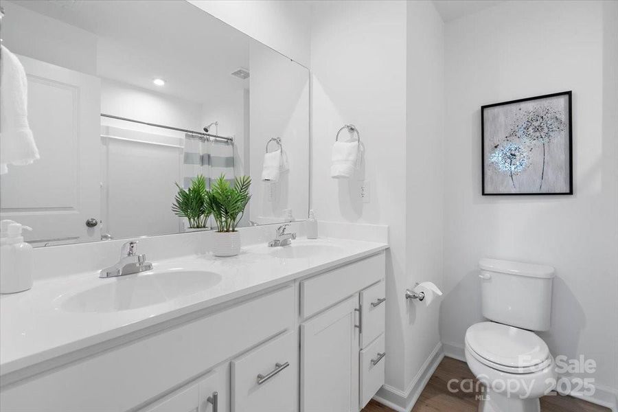 Primary ensuite with dual sink vanity