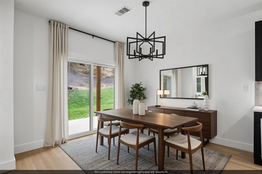 Virtually staged Dining space with a chandelier and light wood-type flooring