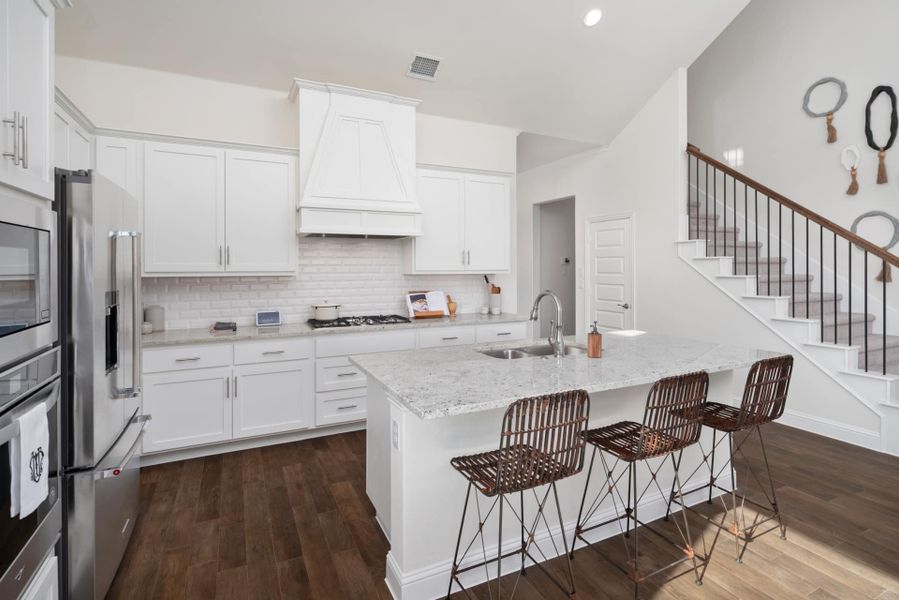Representative furnished interior of a home built from the The Trinity Executive by UnionMain Homes in Lake Breeze, Lavon (Image 9).