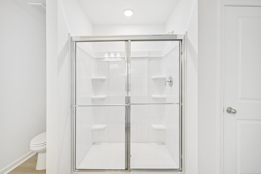 Representative furnished interior of a home built from the Brooke by Ashton Woods in Middleton Farms, Middlesex (Image 12).