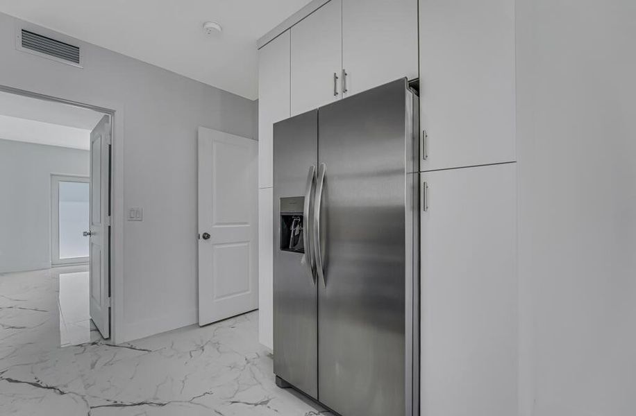 Furnished interior view inside a new home in , Boynton Beach (Image 3).