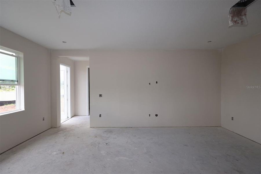 In-progress construction of a new home in Center Lake on the Park, St. Cloud, FL (Image 8).