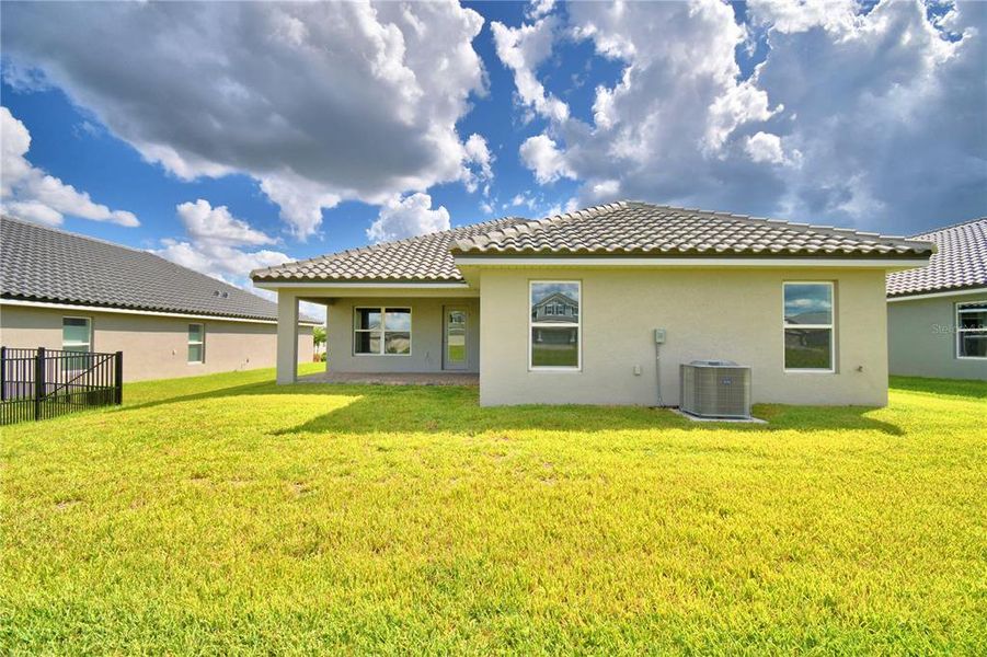 Exterior details and patio area of a home in , Auburndale (Image 32).