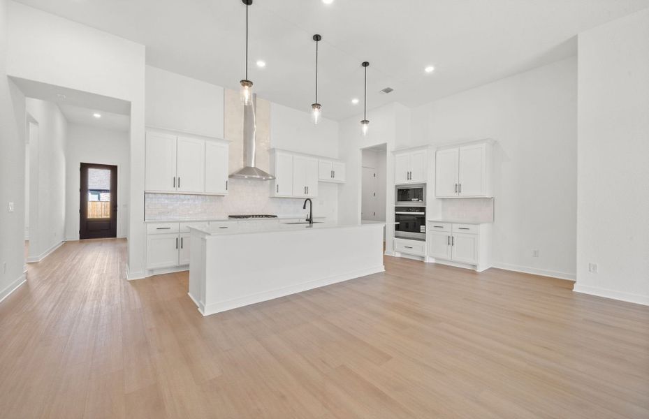 Furnished interior view inside a new home in 6 Creeks, Kyle (Image 10).