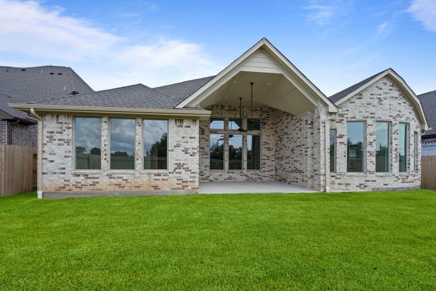 Front exterior of a new home in Coastal Point, League City, TX, highlighting curb appeal (Image 24).