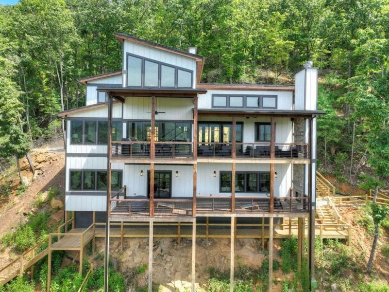 Front exterior of a new home in , Epworth, GA, highlighting curb appeal (Image 24).