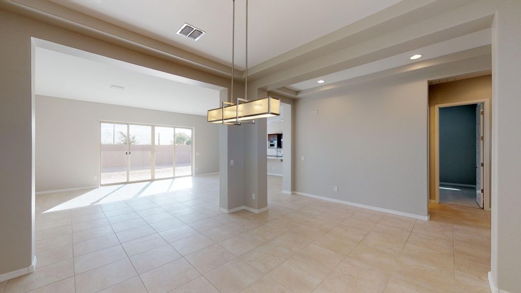Representative furnished interior of a home built from the Benissa by DRB Homes in Windrose, Waddell (Image 11).