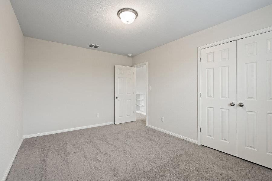 Photos are of a completed model of the same floor plan and are for illustrative purposes only. Actual home is under construction and design selections, materials, and features may differ. Confirm final specifications with the New Home Consultant.
