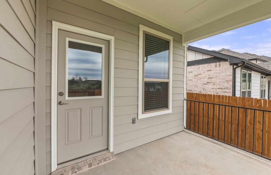 Exterior details and patio area of a home in Saddleback at Santa Rita Ranch, Liberty Hill (Image 28).