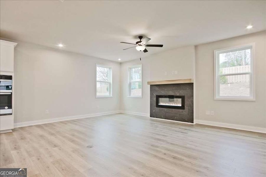 Spacious, unfurnished interior of a new home in The Paddocks at Doc Hughes, Buford (Image 48).