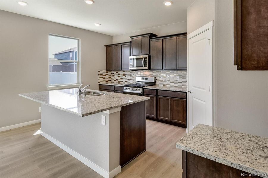 Furnished interior view inside a new home in Timberleaf, Thornton (Image 11).