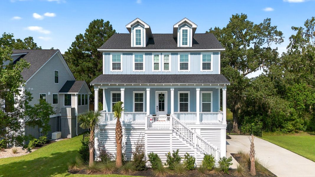 Front exterior of a new home in , Ravenel, SC, highlighting curb appeal (Image 19).