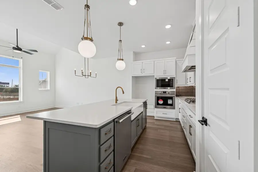 Furnished interior view inside a new home in Retreat at Oak Park, Houston (Image 1).