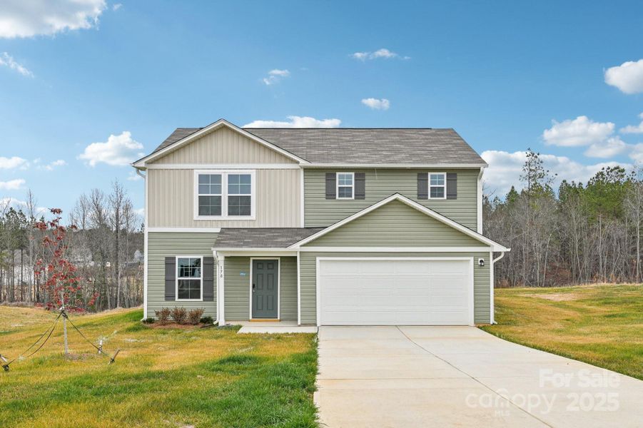 Front exterior of a new home in The Pines at Stoney Point, Lexington, NC, highlighting curb appeal (Image 7). Front exterior of a new home in The Pines at Stoney Point, Lexington, NC, highlighting curb appeal (Image 7).
