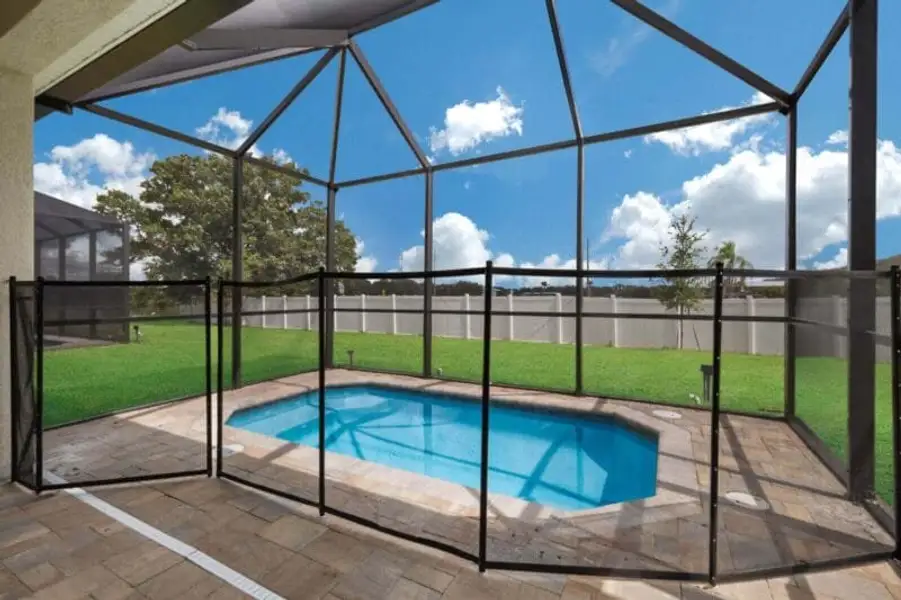 Exterior details and patio area of a home in Reflection Villas at Watercolor Place, Bradenton (Image 4).
