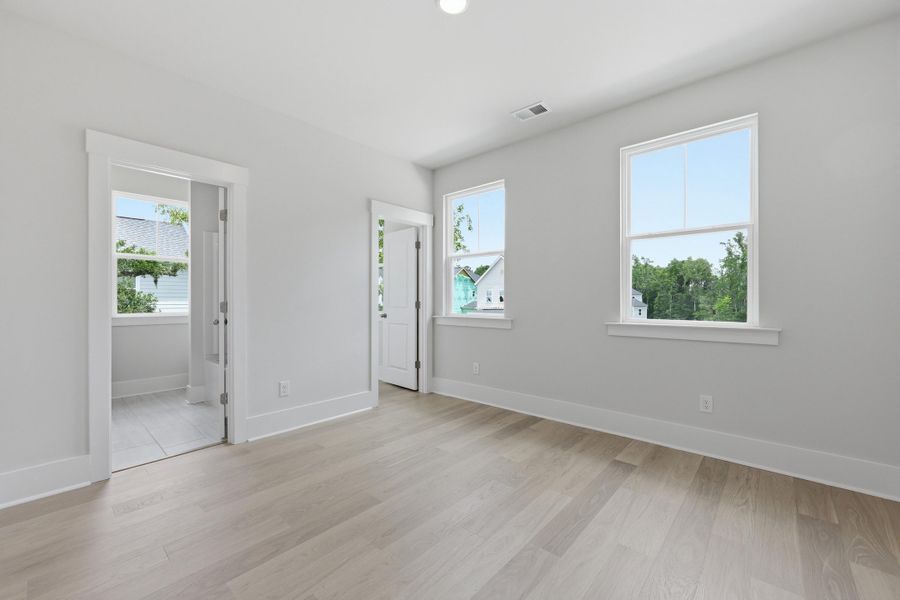 Spacious, unfurnished interior of a new home in Indigo Grove Single Family Homes, Johns Island (Image 29).