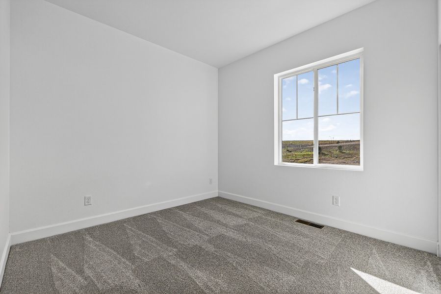 Spacious, unfurnished interior of a new home in Trailstone City Collection, Arvada (Image 17).