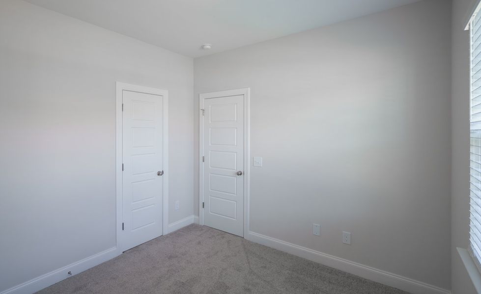 Representative unfurnished interior of a home built from the The McKee by Cothran Homes in Holly Ridge, Greenville (Image 22). Representative unfurnished interior of a home built from the The McKee by Cothran Homes in Holly Ridge, Greenville (Image 22).