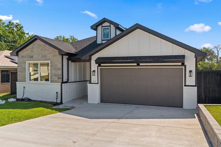 View of front of house with a garage