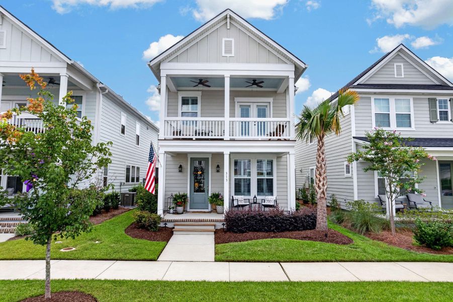Front exterior of a new home in Nexton - Midtown - The Park Collection, Summerville, SC, highlighting curb appeal (Image 22). Front exterior of a new home in Nexton - Midtown - The Park Collection, Summerville, SC, highlighting curb appeal (Image 22).