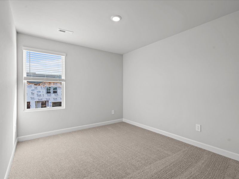 Spacious, unfurnished interior of a new home in Northbrook Village Townes, Taylors (Image 17).